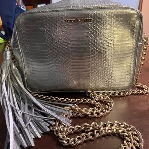 Victoria’s Secret metallic Crossbody faux python bag with long gold chain.